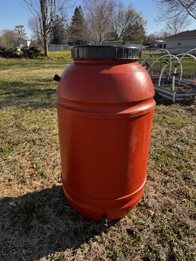 A Quick Guide to Installing a Rain Barrel - image of rain barrel before being installed